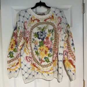 Gorgeous knit sweater with all over floral print